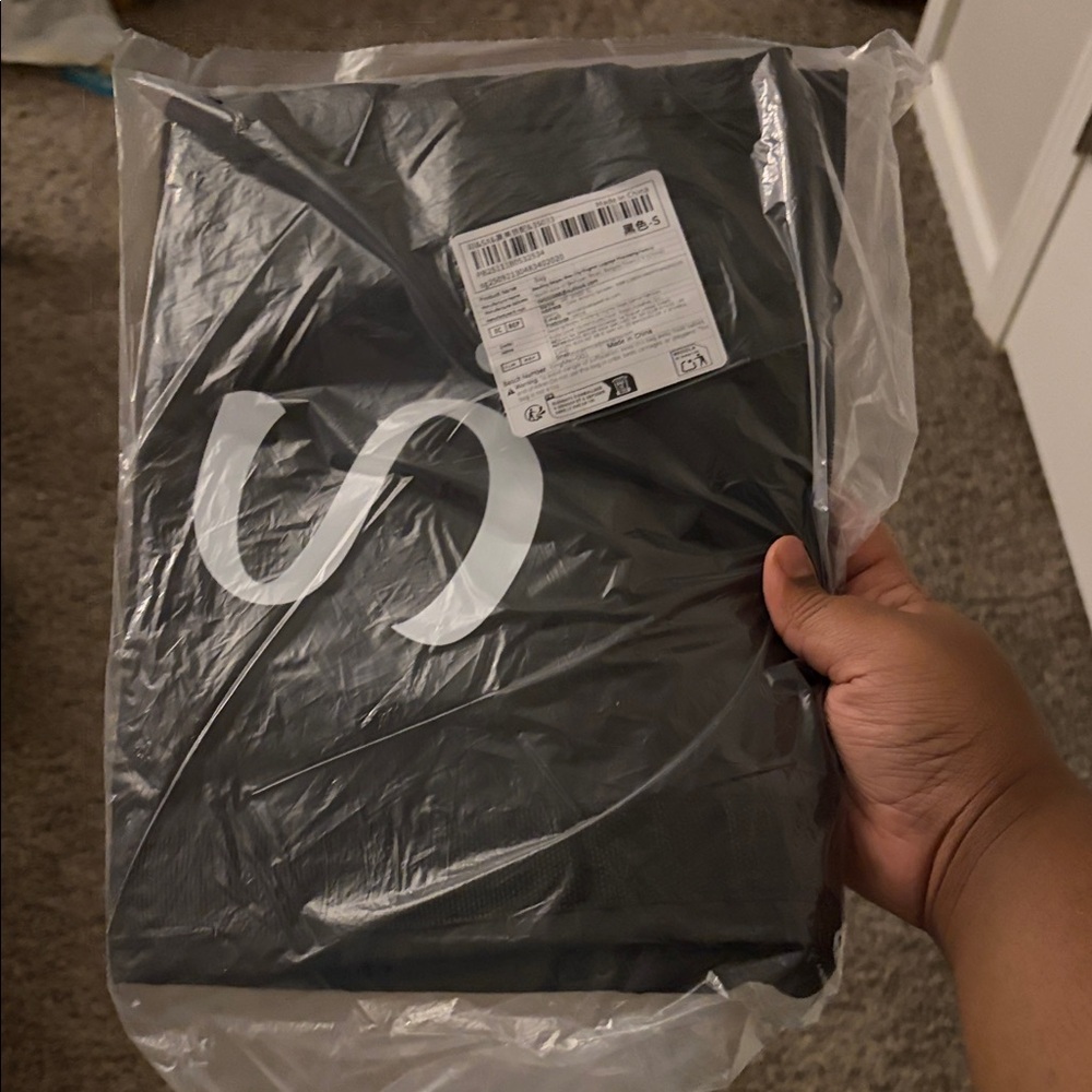 Black Backpack with White Logo